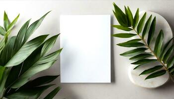 AI generated white paper with green leaves on a white background photo