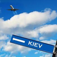 travel sign on sky photo