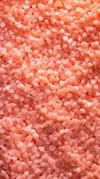 AI generated Close-Up Texture of Peach Fuzz Colored Granules in Light photo