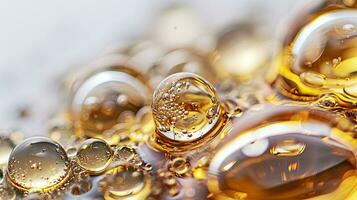 AI generated Golden Skincare Oil Drops with Air Bubbles on White Background photo