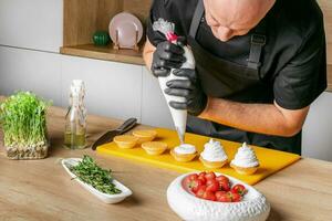 AI generated Chefs Precision in Artful Tart Topping photo