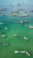 Vibrant Fishing Fleet on Tranquil Waters photo