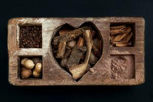 mixed berries and autumn fruits in a wooden box photo