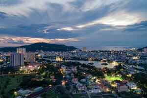 Sunset in Vung Tau city and coast, Vietnam. Vung Tau is a famous coastal city in the South of Vietnam photo