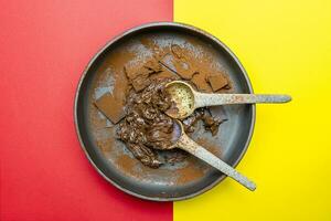 hazelnut cocoa cream and chocolate pieces mixed in a bowl photo