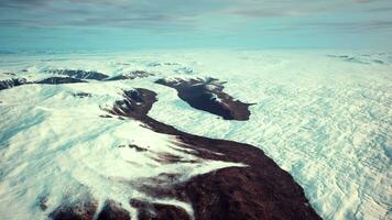 A breathtaking snowy mountain range seen from above video