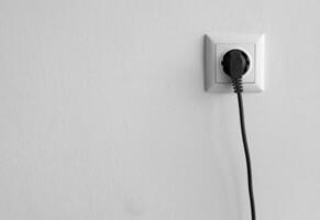 Home power outlet in the wall photo