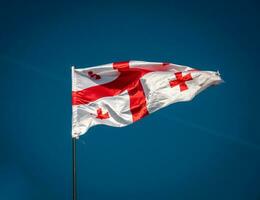 Flag of Georgia waving closeup photo