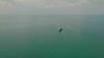 Solitary Boat Drifting on Tranquil Sea video