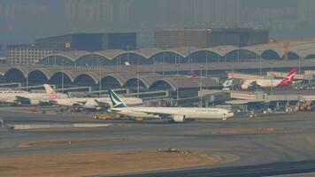 Row of aircraft docked at the terminal video