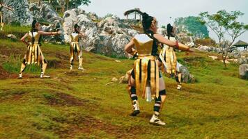 a group of royal soldiers in golden costumes were practicing martial arts on a rocky hill video