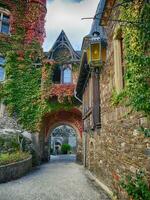 Fall colors on Reichsburg Castle  at Cochem, Germany photo