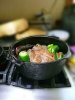 Braised beef pot roast with  jalapenos and Mexican chilis photo