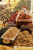 Spices, nuts and other snacks photo