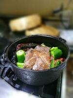 Braised beef pot roast with  jalapenos and Mexican chilis photo