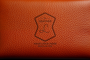 AI generated Logo mockup on leather background psd