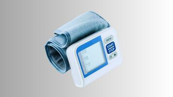 Isolated Blood Pressure Meter on White Background, Healthcare Monitoring Equipment photo