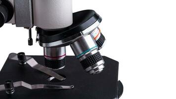 aislado microscopio en blanco antecedentes foto
