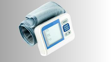 Isolated Blood Pressure Meter on White Background, Healthcare Monitoring Equipment photo