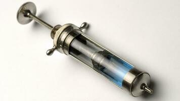 Vintage Glass Syringe, Nostalgic Medical Relic isolated photo