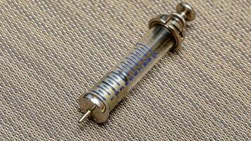 Vintage Glass Syringe, Nostalgic Medical Relic isolated photo