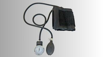 Isolated Blood Pressure Meter on White Background, Healthcare Monitoring Equipment photo