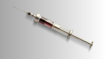 Vintage Glass Syringe, Nostalgic Medical Relic isolated photo