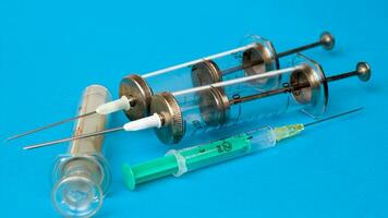 Vintage Glass Syringe, Nostalgic Medical Relic isolated photo