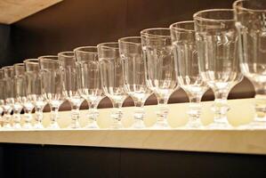 Crystal wine glasses on the table photo