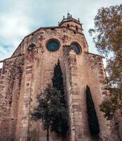 St Mary Church in Catalonia photo. Romanesque architecture in Caldes de Montbui, Barcelona Province photo