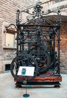 View of the mechanism of the turret clock in museum. Clockwork mechanism of church clock tower photo. photo