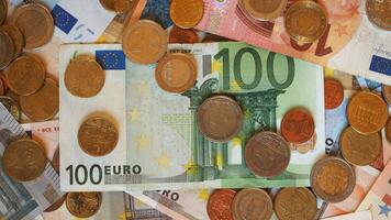 euro note and coins background photo