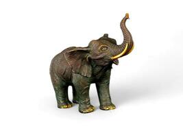 Elephant statue miniature animal isolated on white photo