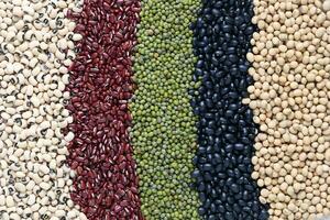 Top view of Five colored beans on wooder background, Healthy eating concept photo