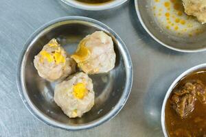 Dim sum with pork in minimal style. photo