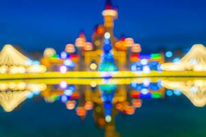 Defocused background with shiny bright celebrate lights as bokeh. photo