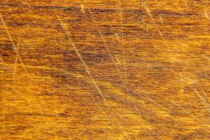 Granular material, solid wood with a structural surface for design textures. Grunge panel with rough coating photo