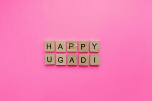 March 22, Ugadi, a minimalistic banner with an inscription in wooden letters photo