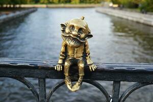 Kaliningrad, Russia, bronze statuette of homlin grandfather Karl on Honey Bridge, city brownie, local landmark photo