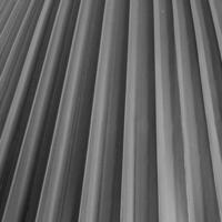 Abstract monochrome image of parallel lines with a gradient texture, suitable for backgrounds and graphic design elements. photo