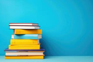 AI generated horizontal banner, stack of books on a blue background, knowledge day, back to school, place for text photo