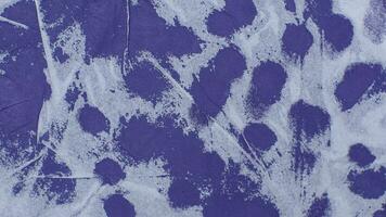 Blue textured paper with white patterns photo