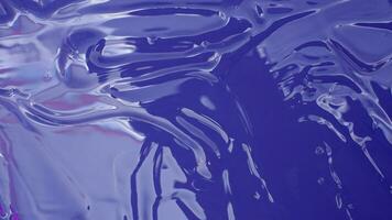 Shiny blue viscous liquid texture photo