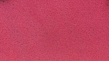 Red sandpaper texture background. Abstract background and texture for design. photo