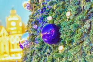 Background with blur on the theme of Christmas or New Year with toys and shining elements photo