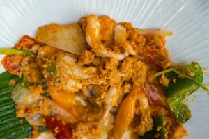 Stir fried squid with salted egg sauce photo