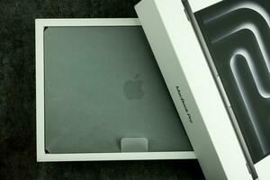 Bangkok, Thailand - December 24, 2023 MacBook Pro 14 inch, M3 Max 2023 with the box photo