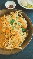 Egg Noodles with chicken it called Khao Soi Kai photo