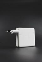 Bangkok, Thailand - December 27, 2023 Power adapter 96 watts for charger new MacBook Pro M3 Max photo