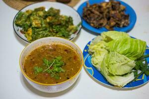 Many Thai food places on the table. photo